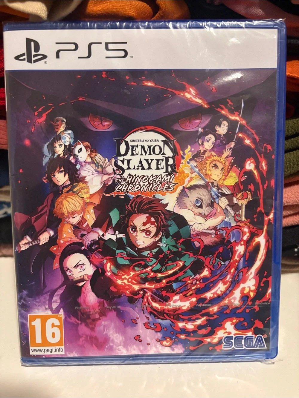 Demon Slayer: The Hinokami Chronicles PS5 Game - Black & Red Cover